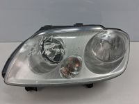 Hauptscheinwerfer links <br>VW CADDY III KASTEN/GRO�RAUMLIMOUSINE (2CA,
